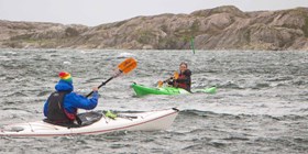 Cluster of sea kayaks  Introkurs för kajakledare, Friluftsfrämjandet 